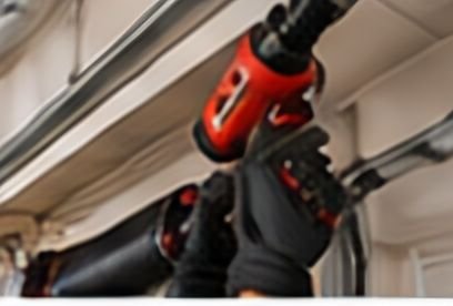 Garage door cable drum and shaft